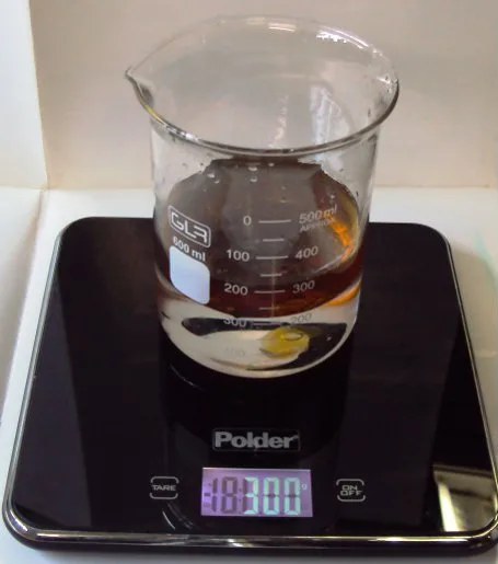 100ml of engine oil added to the water in the beaker