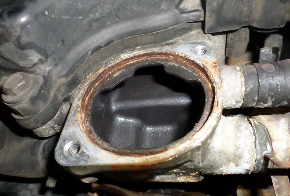 The same water pump housing after the clean, back to bare metal