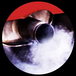 White smoke from an exhaust pipe