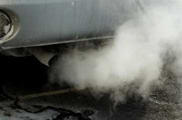 Thick white smoke from a car's exhaust