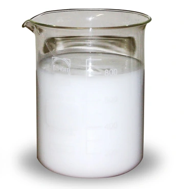 A beaker of milky white Liquid Intelligence 600 coolant