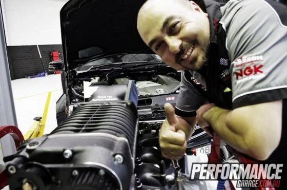 Sonny at AutoWerks Automotive with a supercharged engine